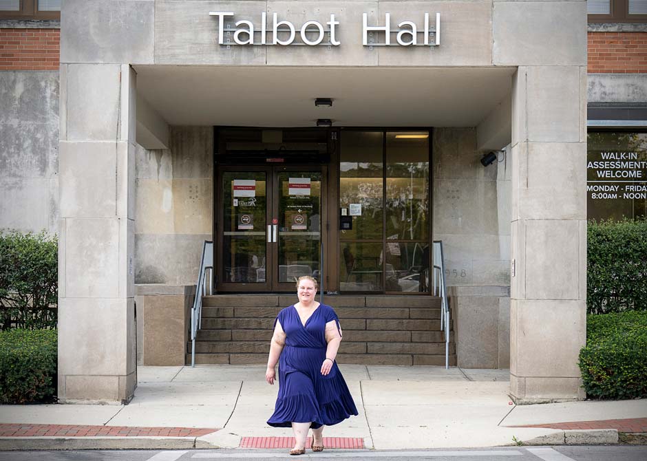 Dr. Julie Teater in front of Talbot Hall