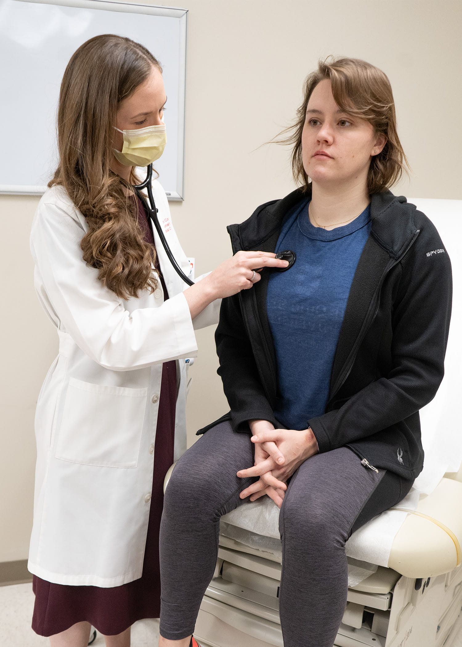 Dr. Megan Conroy exams patient