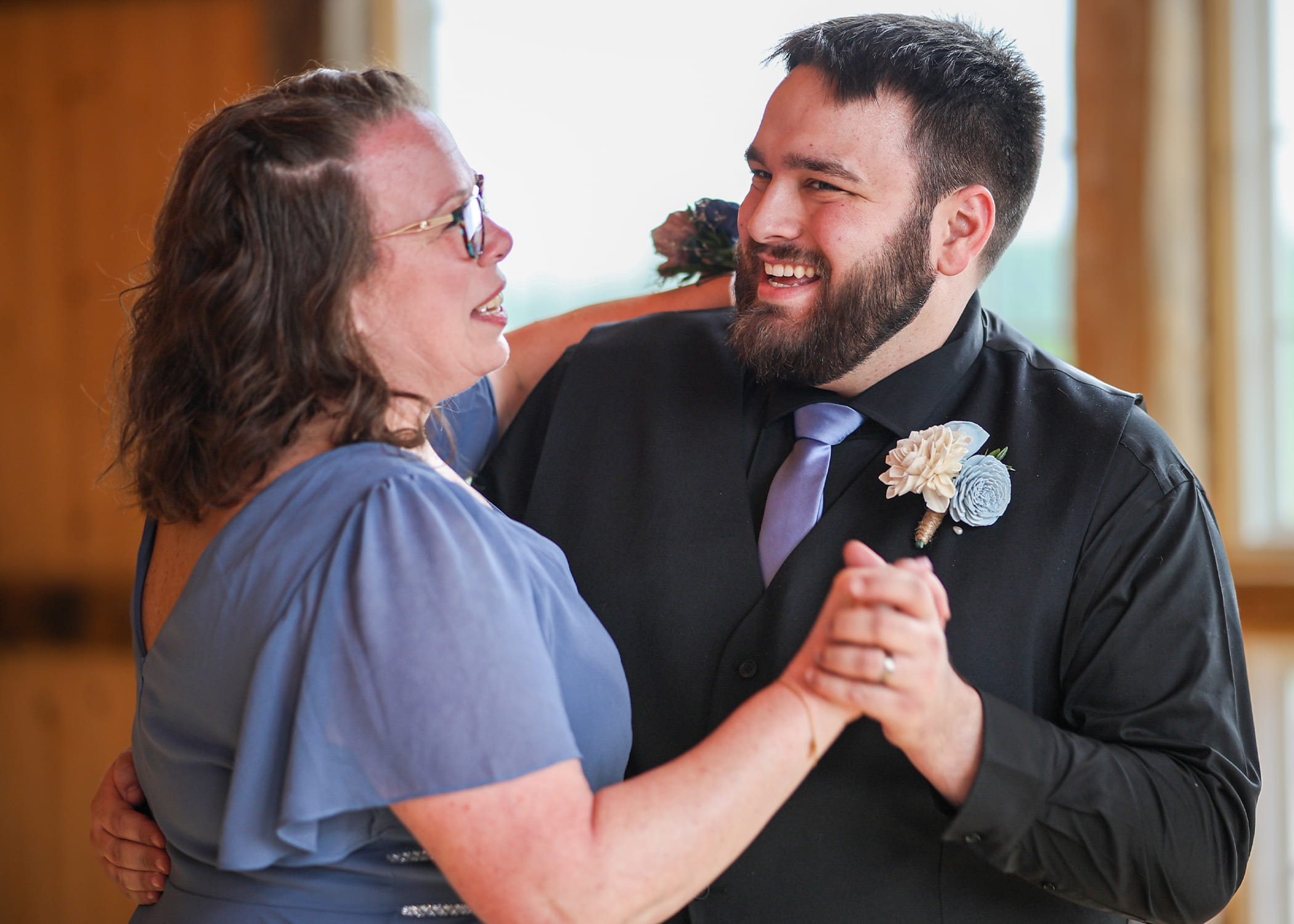 Just a few months after ultra-minimally invasive spine surgery at Ohio State Wexner Medical Center, Elaine Drumm dances with her son, Ryker, at his wedding. 