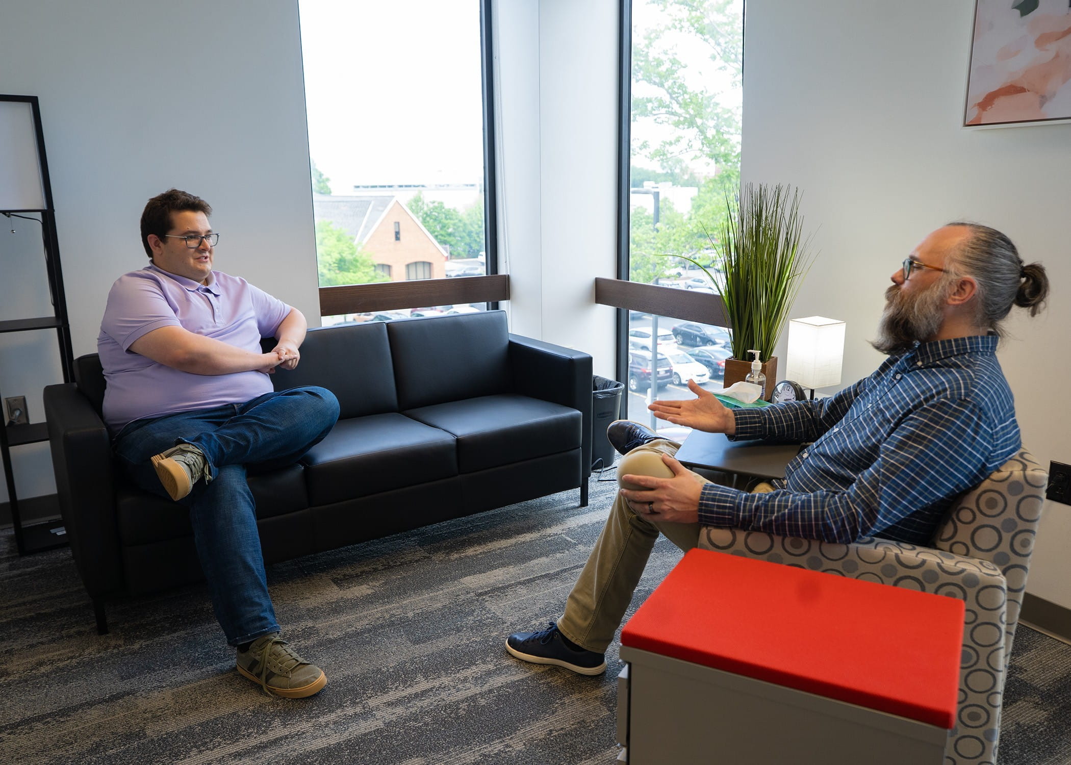 Nicholas Allan, PhD, as associate professor in the Department of Psychiatry and Behavioral Health at Ohio State, counseling a male patient. 