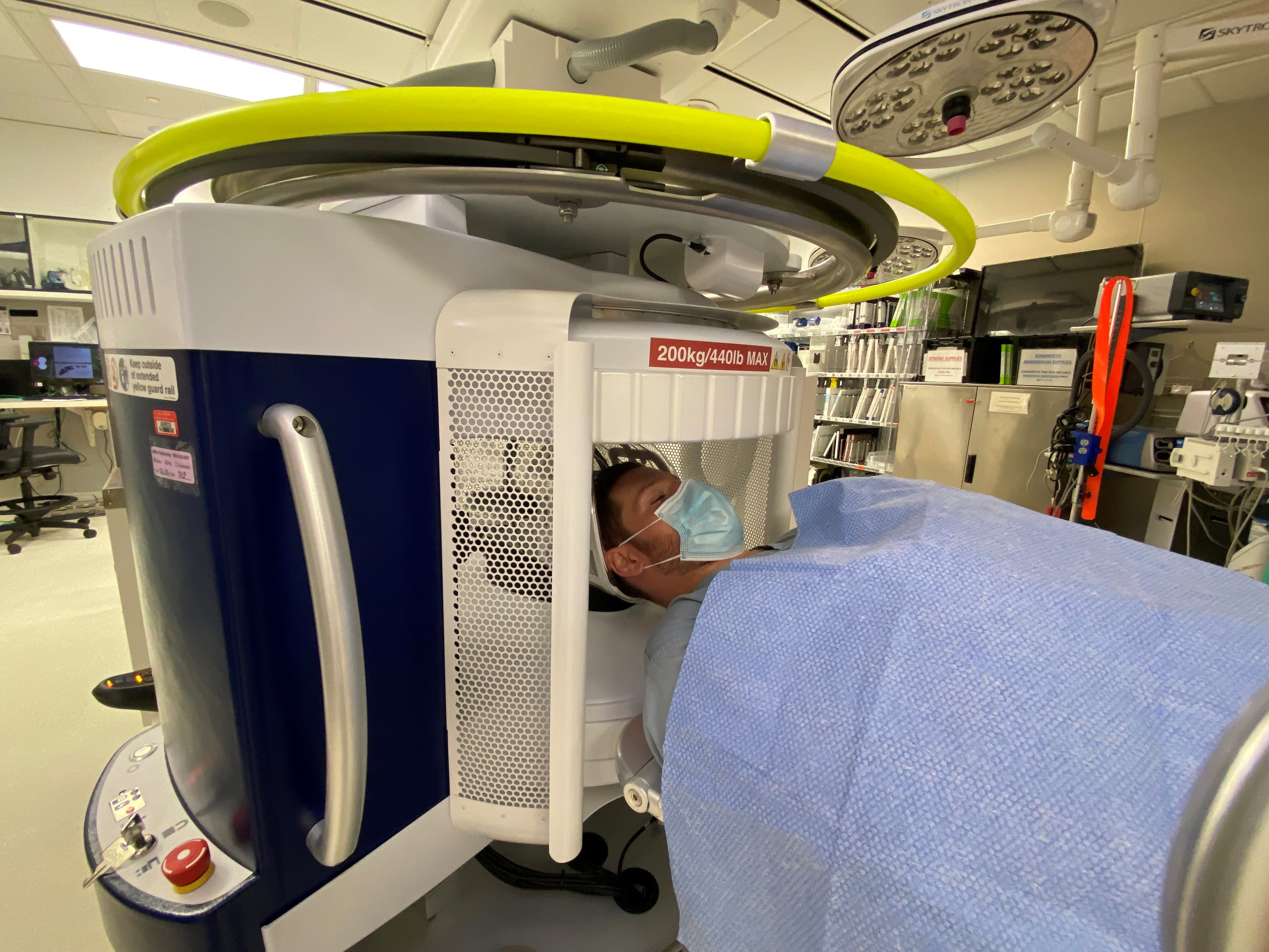 Patient in Hyperfine Swoop portable MRI in Operating Room
