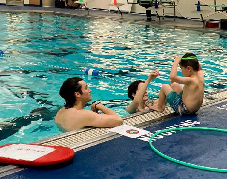 Cooper Sotello, 4, and his mom, Sarah Cline, participate in the new adaptive swim class led by researchers at The Ohio State University Wexner Medical Center. The class teaches swimming and water safety to children on the autism spectrum.