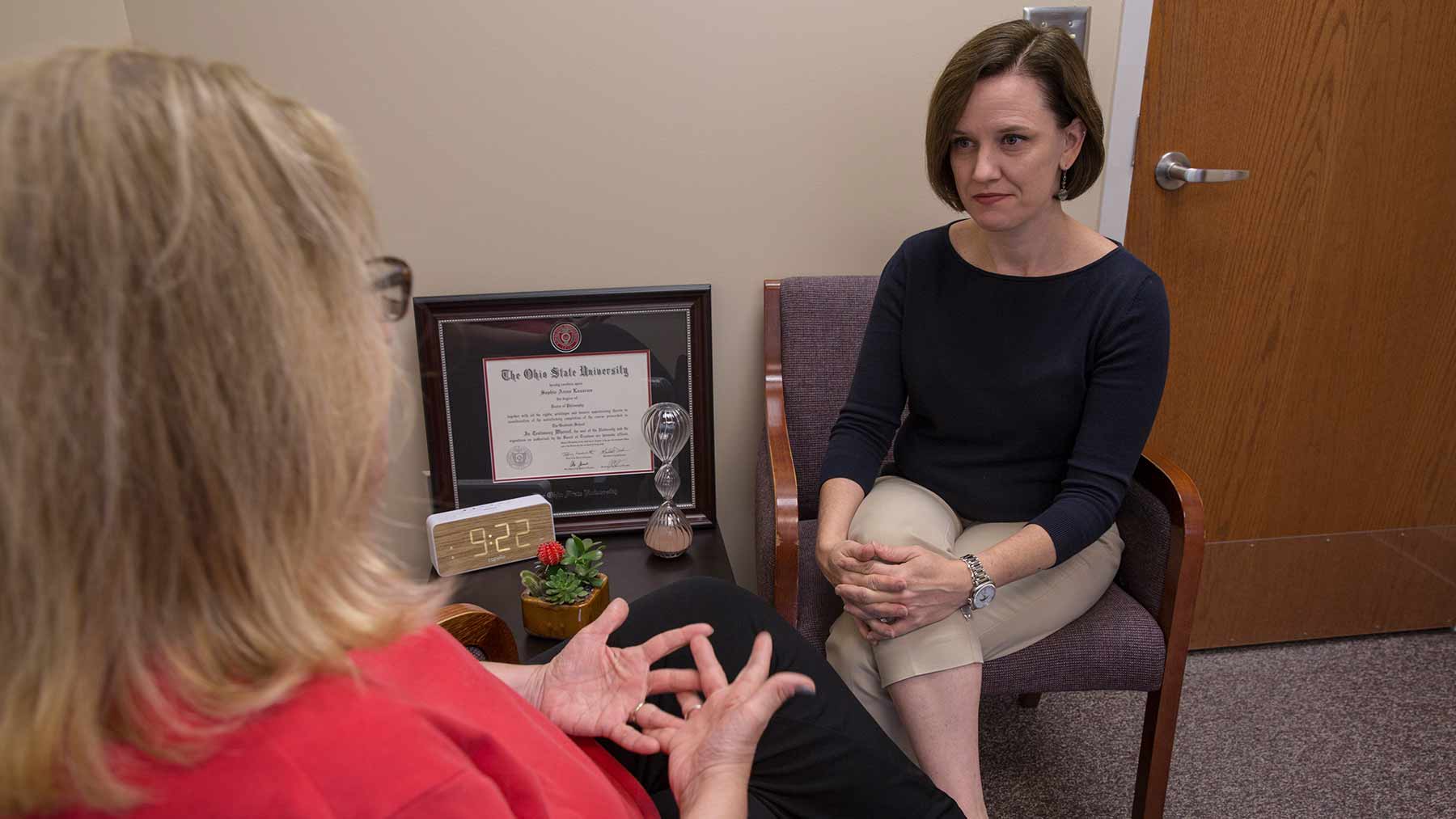Dr. Kristen Carpenter counsels a patient