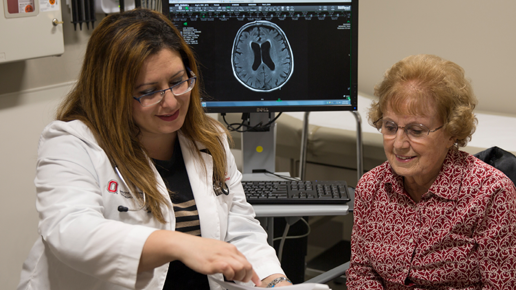 Dr. Rawan Tarawneh and a female Alzheimer's patient 