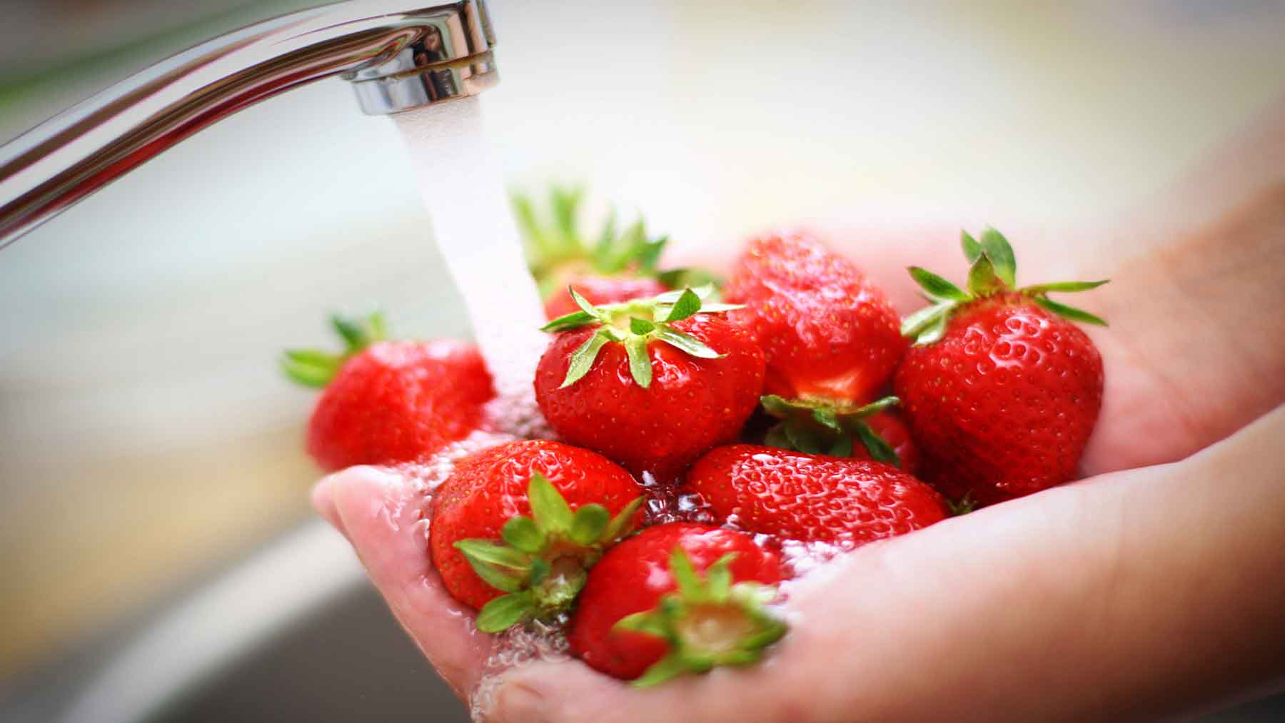 How important is it to wash fruits and vegetables before eating