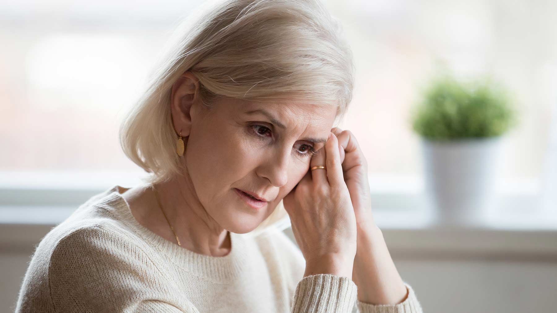 older woman looking worried