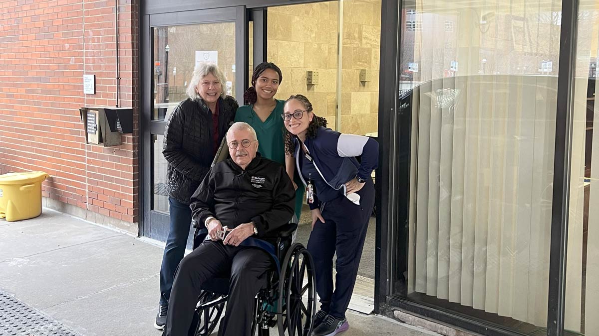 patient Jimmy Moore with Dodd staff