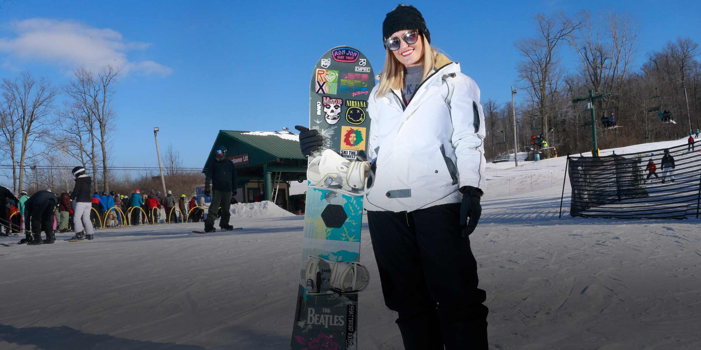 Ashley Poland with snowboard 
