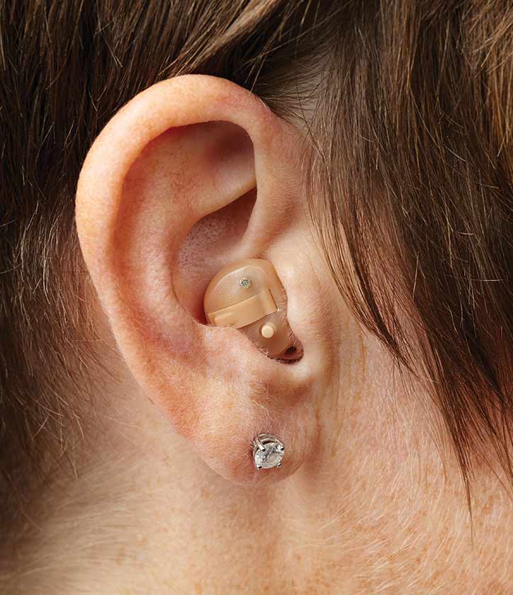 Half shell hearing aid