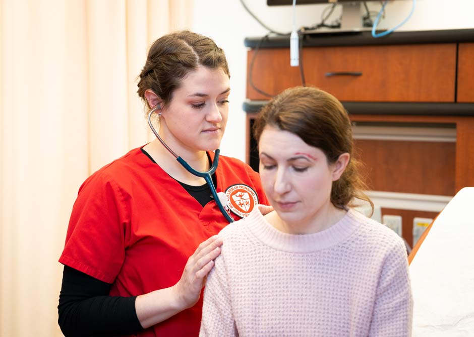 Student nurse taking care of a patient