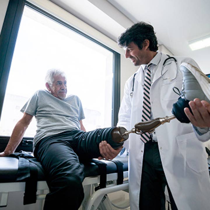 man with prosthetic leg getting exam