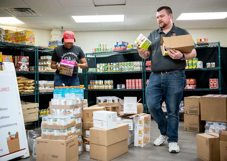 food drive, organizing cans of food