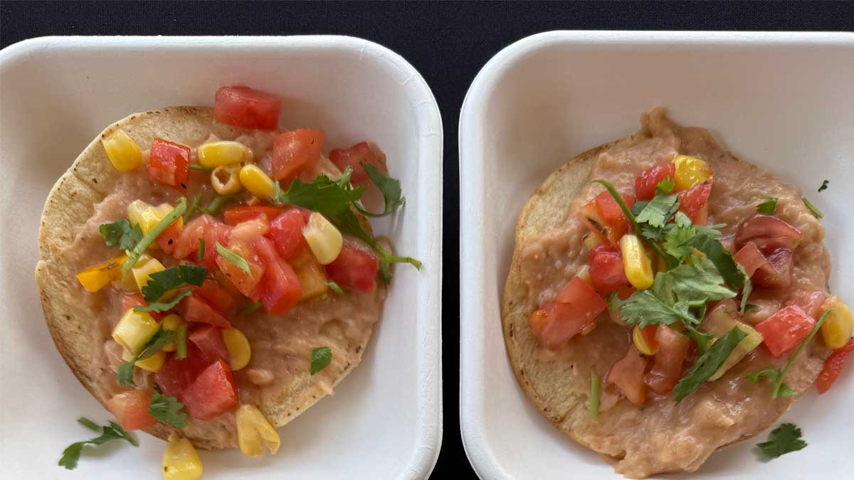 tomato and corn tostadas on a plate