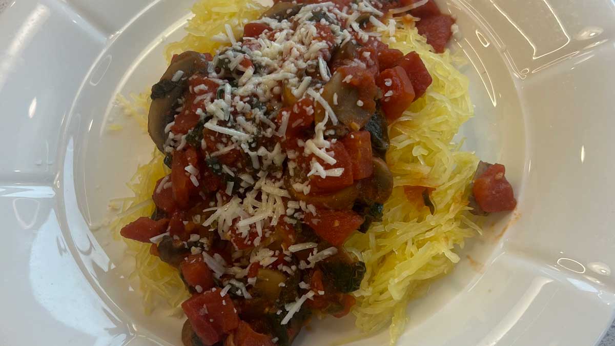 spaghetti squash with mushroom marinara on a plate