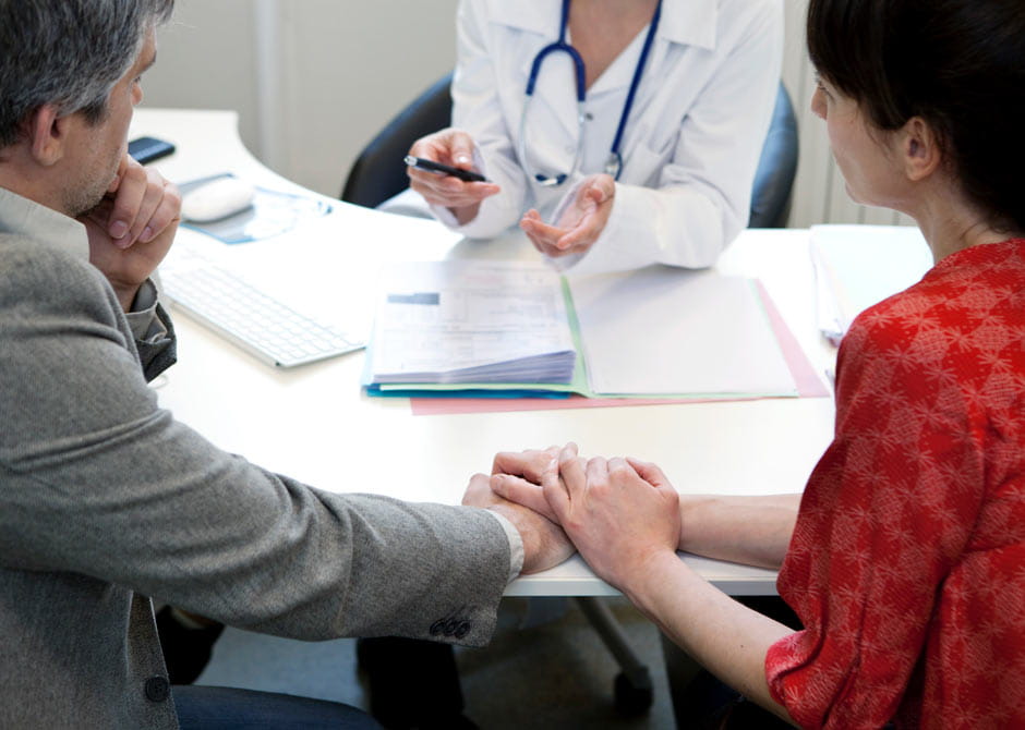 Couple in consultation with doctor