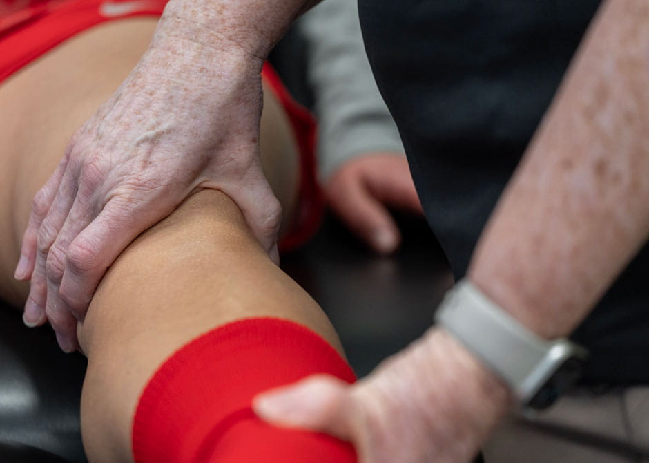 performing a knee exam at Ohio State