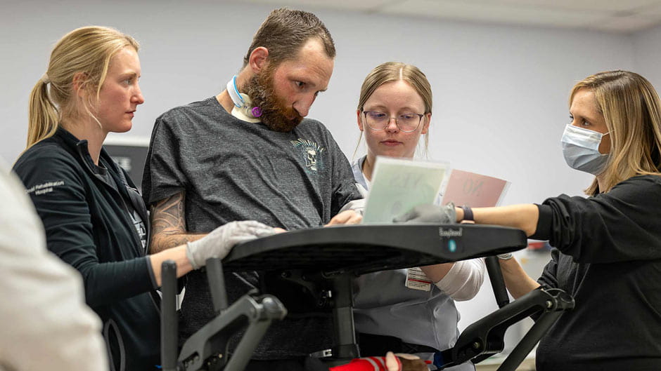 patient-TJ-and-Therapists