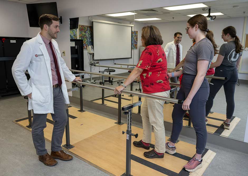 Timothy Hake doing physical therapy with neurological rehabilitation