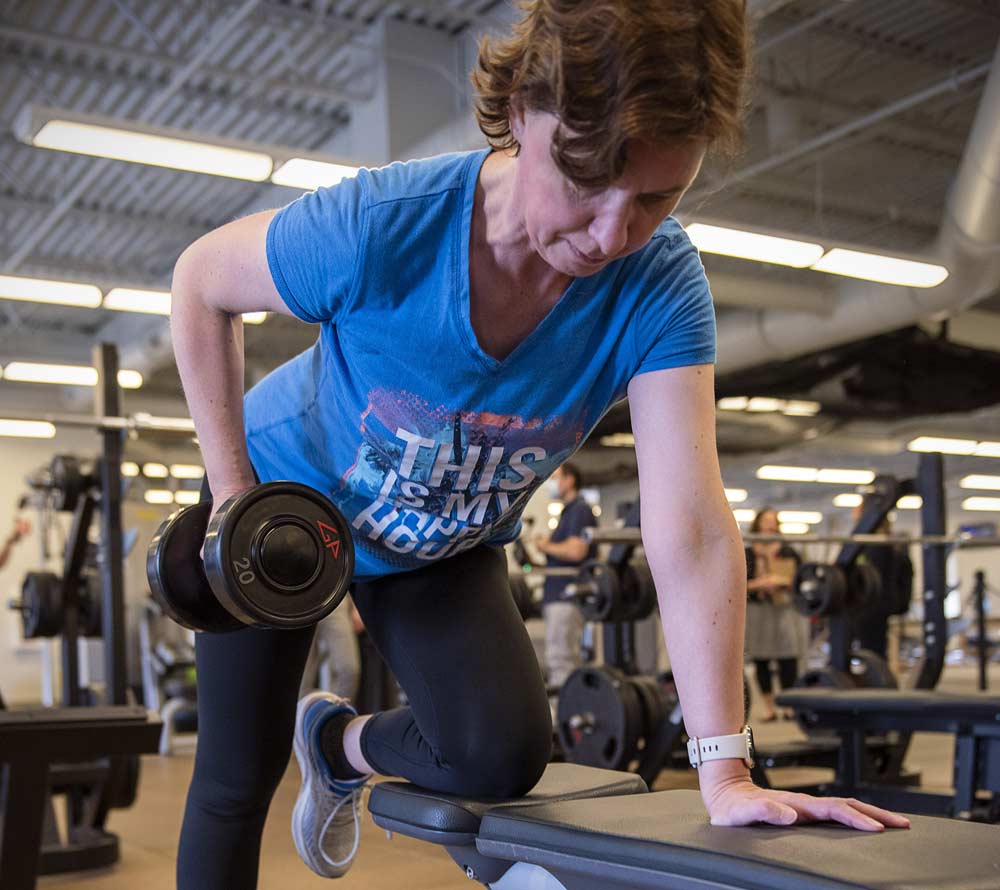 patient with Parkinson's disease doing physical rehabilitation