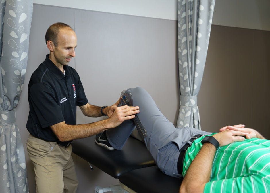 provider performing physical therapy