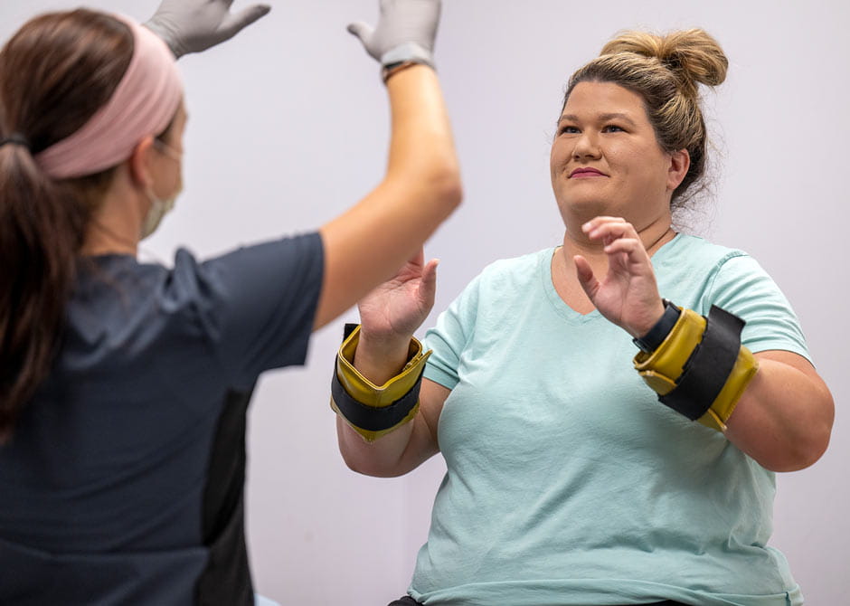 a patient doing occupational therapy with a therapist